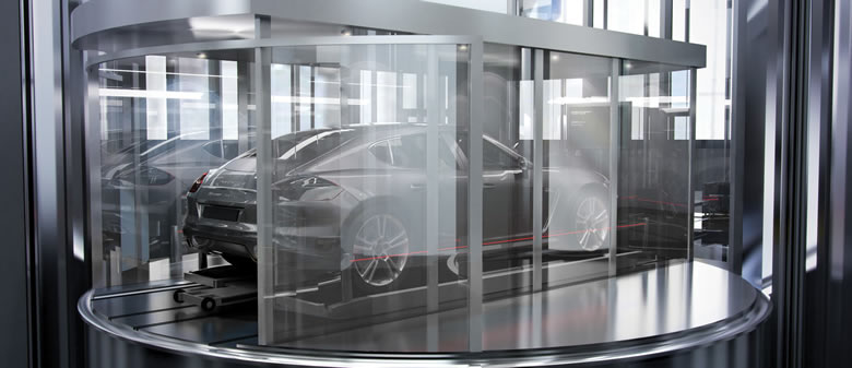 The Dezervator - A high-tech car elevator that allows residents at Porsche Tower to park their fancy cars inside the apartment.